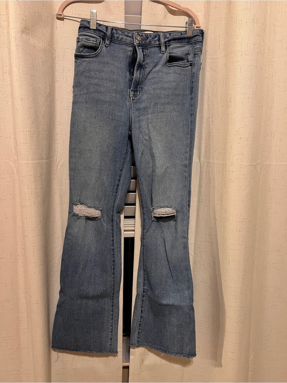 Classic Light Blue Bootcut Jeans with Knee Rips